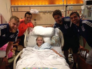 Kupono Low joins Railhawks teammates at a local hospital (Photo: Carolina Railhawks)