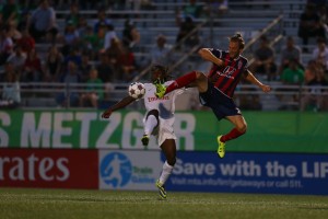 Cory Miller Challenges Lucky Mkosana For A Ball (Photo Credit: NY Cosmos)