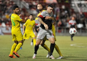 Stefan Antonijevic holds back Eric Hassli (Photo: San Antonio Scorpions)