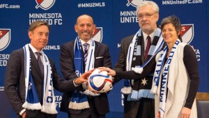 MLS Commissioner Don Garber with Mnnesota United's MLS Ownership (courtesy mlssoccer.com)