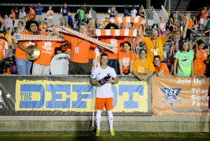 Wes Knight poses with fans after playing his final professional soccer game. (Photo: Rob Kinnan-Carolina RailHawks)
